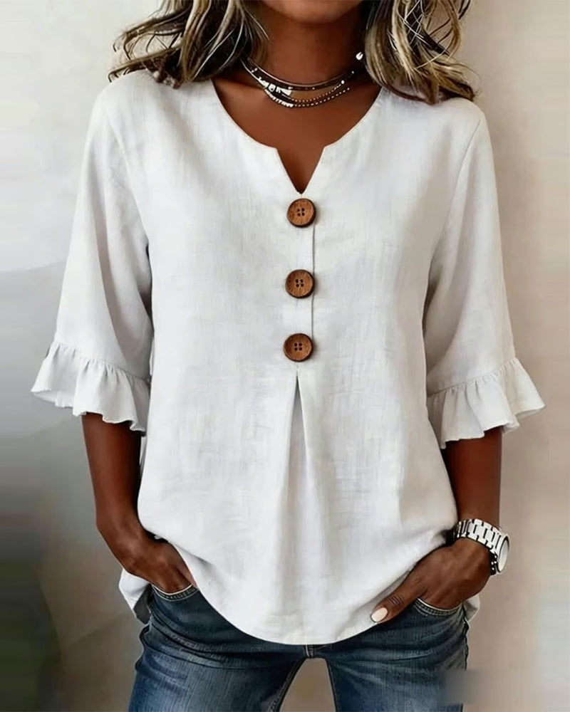 Sophia Blouse in solid cotton-linen with wooden buttons and frill