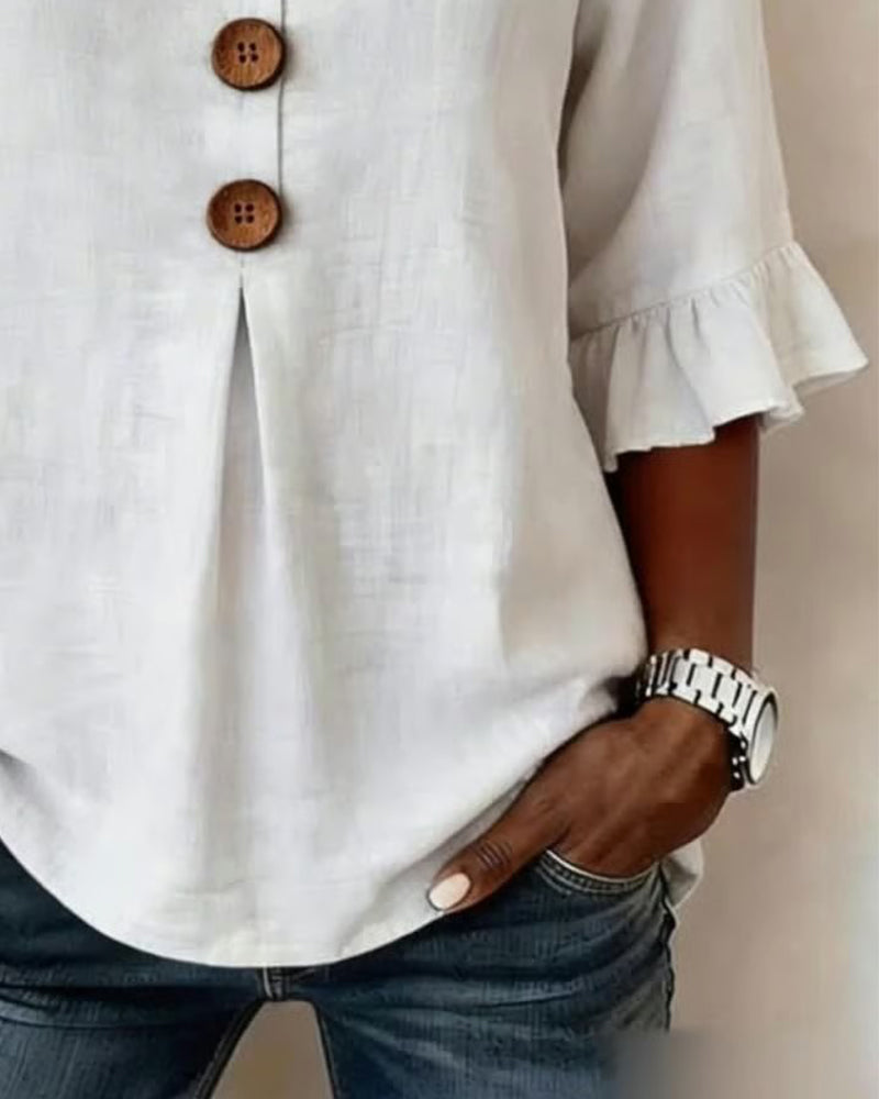 Sophia Blouse in solid cotton-linen with wooden buttons and frill